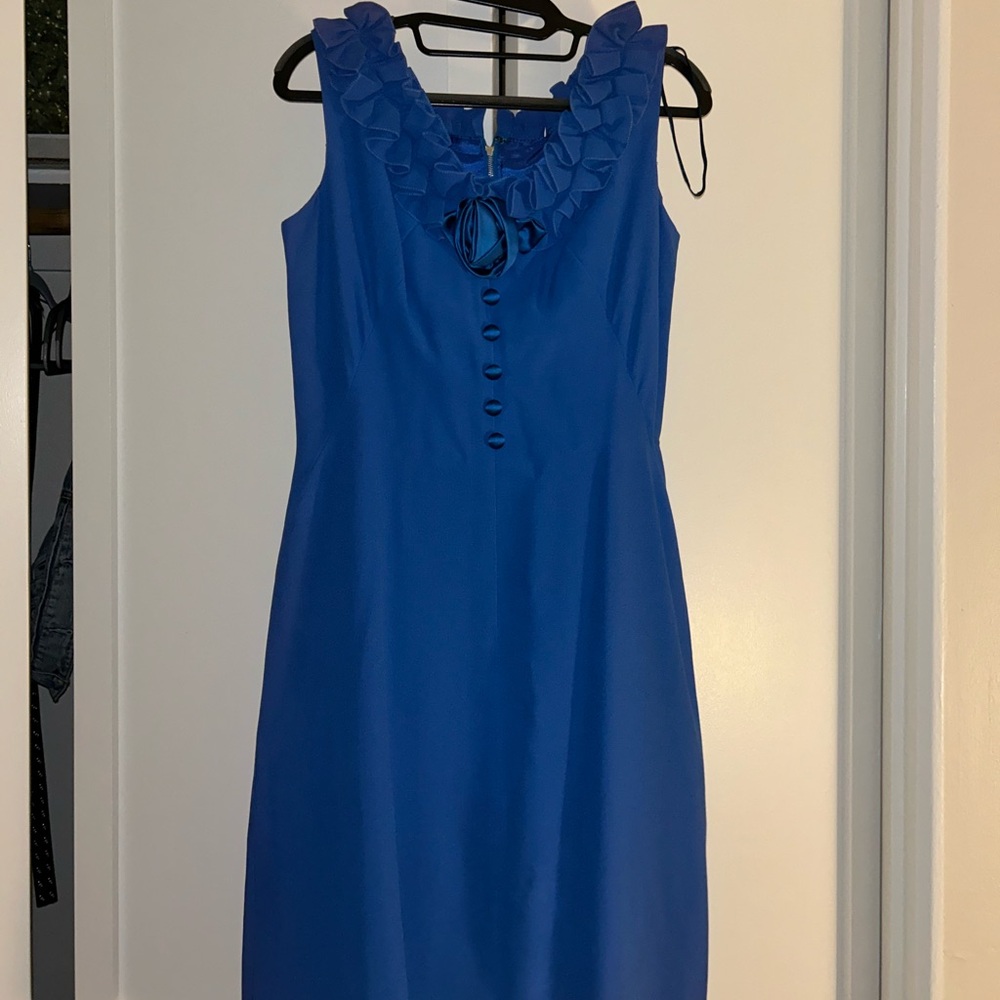 My mom is selling her vintage dresses she wore in her 20s